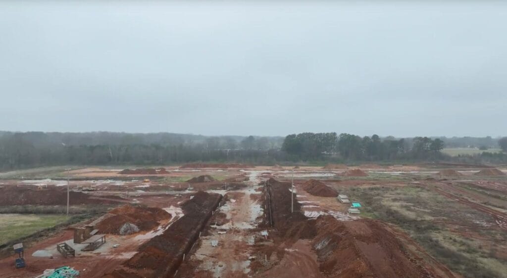 Installing Water & Electric Utilities Land development underway at Emma at Arabella Village in Huntsville, Alabama.