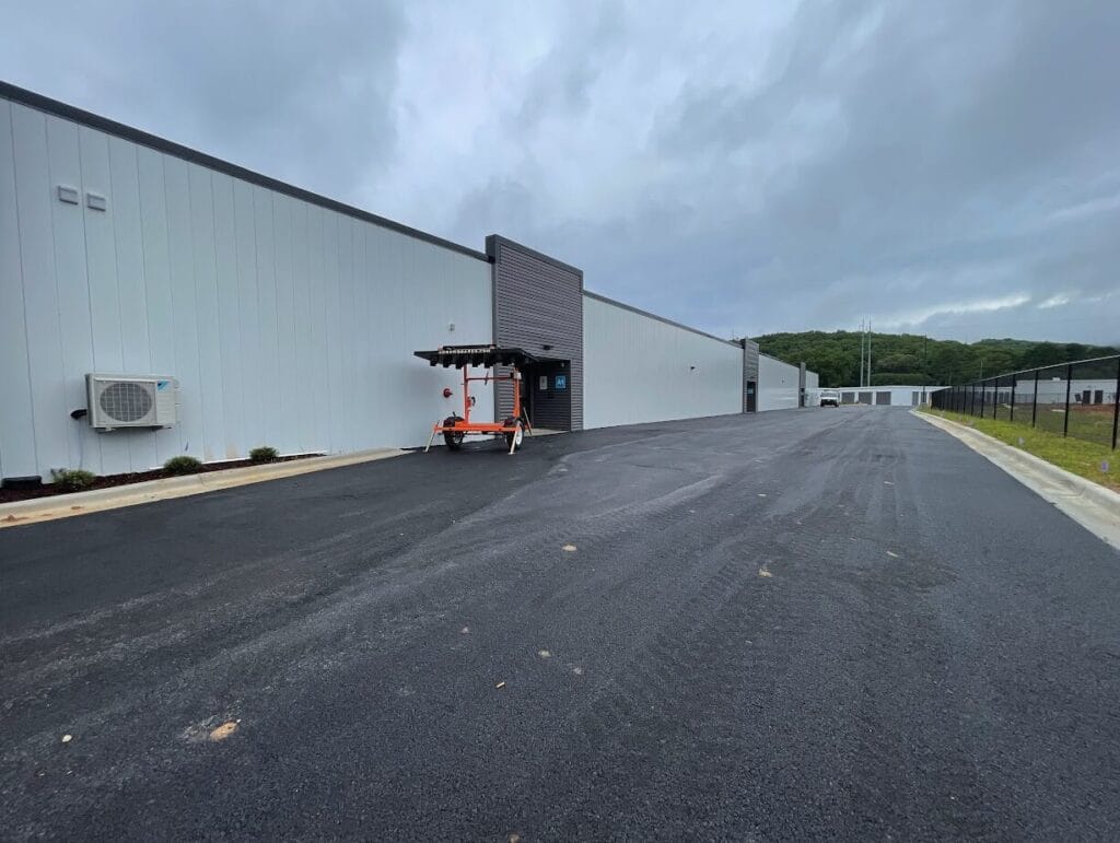 Lease-Up Underway Exterior photo of Huntsville Self-Storage, a completed five-building self-storage facility.